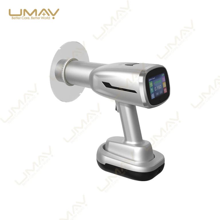 Handheld dental X-ray unit fitted with a circular lead scatter shield for radiation protection.