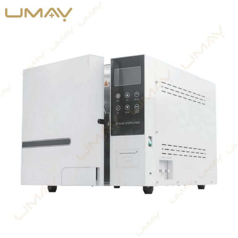 Isolated studio product shot of a white benchtop dental steam sterilizer autoclave with side ventilation slots.